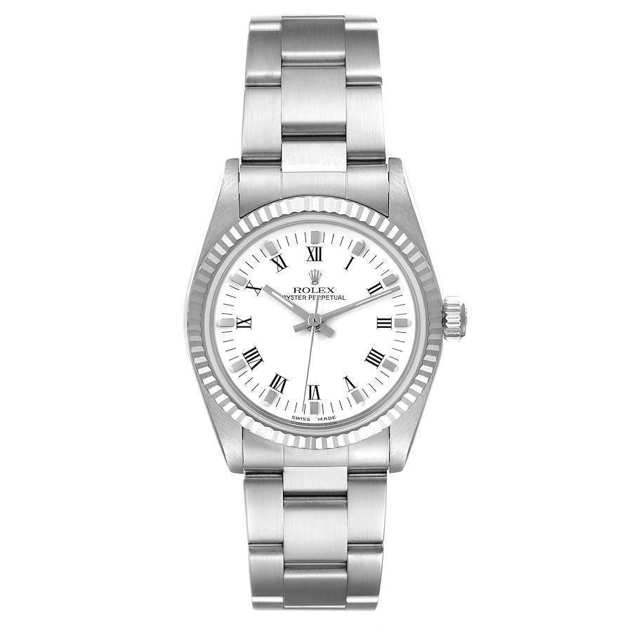 Rolex Midsize Steel White Gold Oyster Bracelet Ladies Watch 77014. Officially certified chronometer self-winding movement. Stainless steel oyster case 31.0 mm in diameter. Rolex logo on a crown. 18K white gold fluted bezel. Scratch resistant