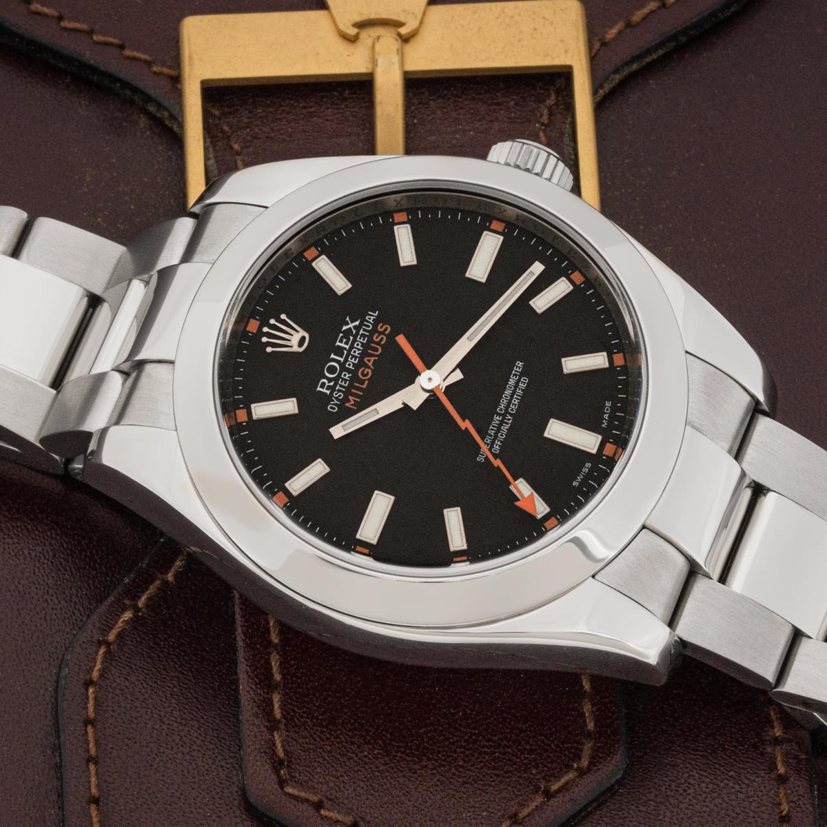 A 40mm Milgauss crafted in stainless steel from Rolex. Features a black dial with applied hour markers and an orange second hand shaped like a lightning bolt.

Fitted with a sapphire glass, a self-winding automatic movement and an Oyster bracelet