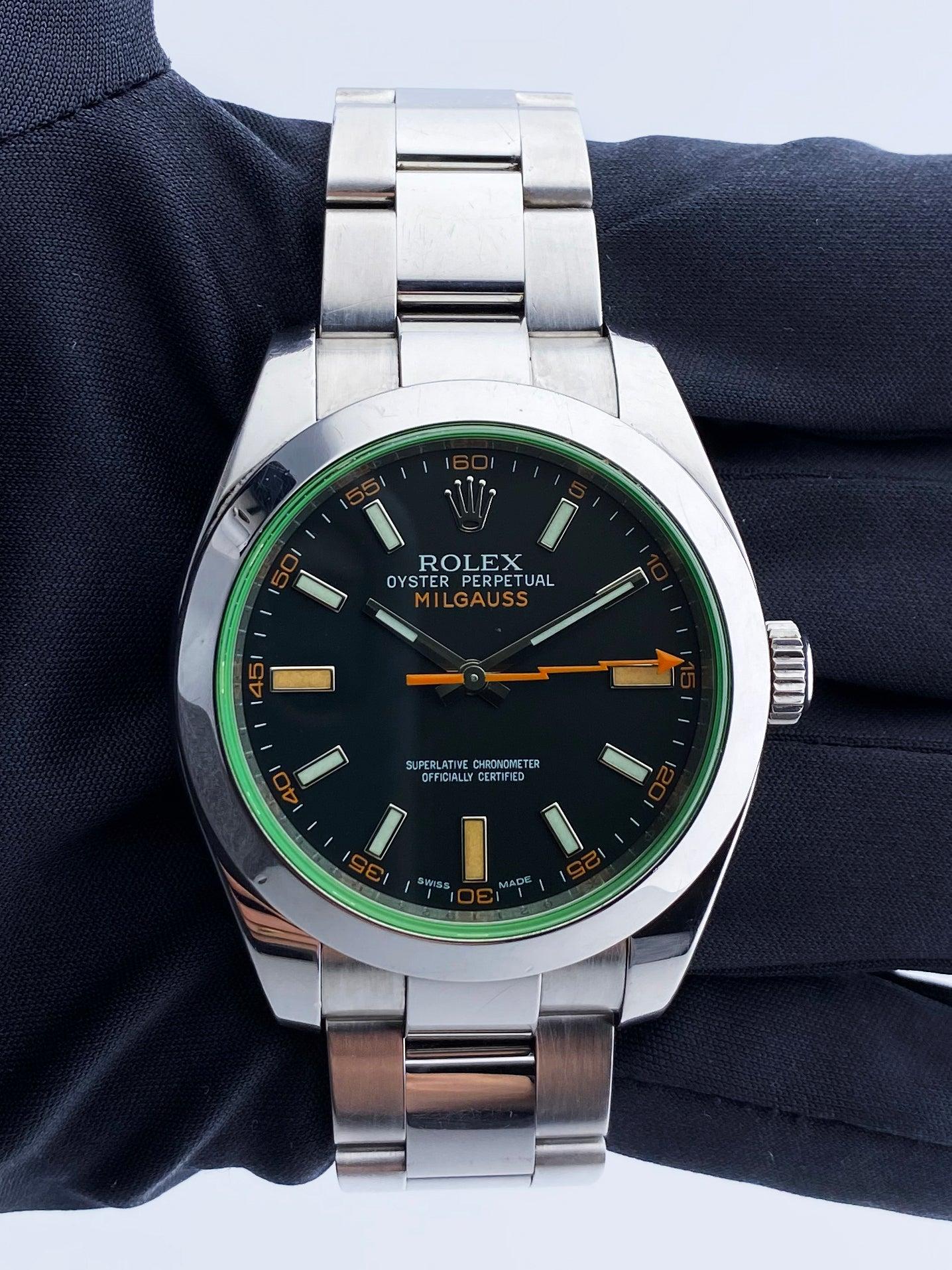 Rolex Milgauss 116400GV Mens Watch. 40mm stainless steel case and smooth bezel. Black dial with luminous silver-tone hands and index hour markers. Minute markers around the outer dial. Stainless steel Oyster Bracelet with fold over clasp. Will fit
