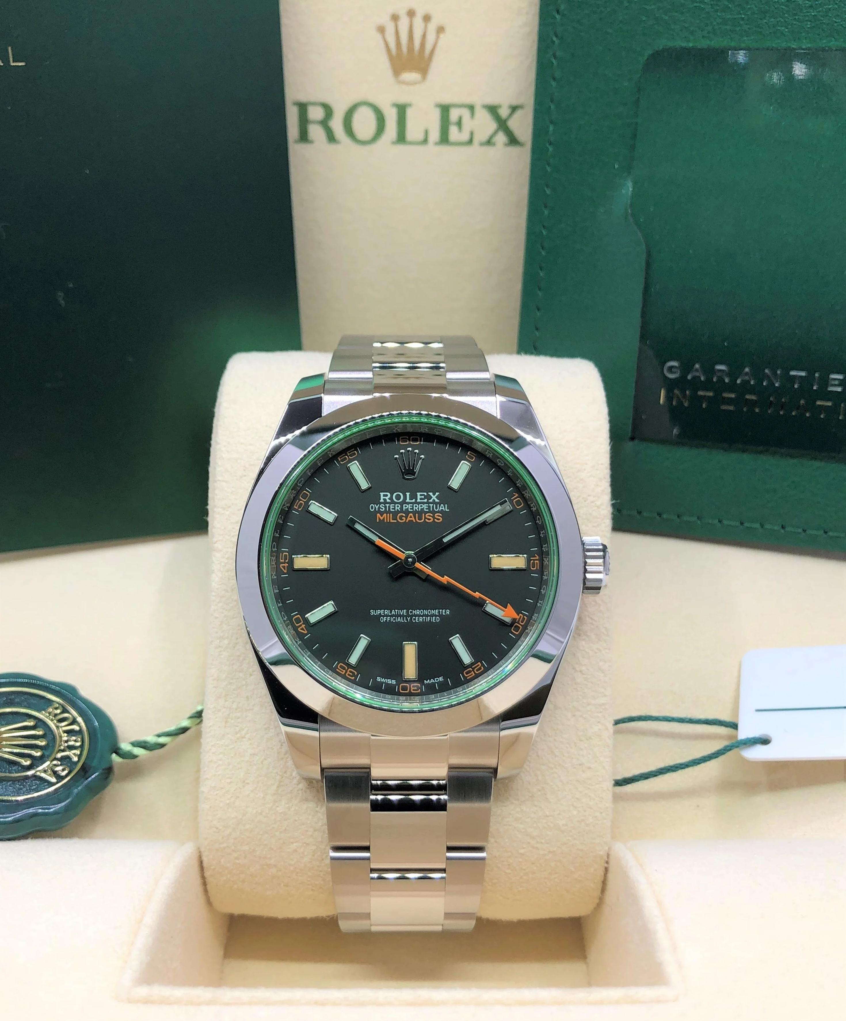 Rolex Milgauss 116400GV has Silver-tone stainless steel case with a silver-tone stainless steel Rolex oyster bracelet. Fixed domed silver-tone stainless steel bezel. Black dial with luminous hands and luminous stick hour markers. Minute markers