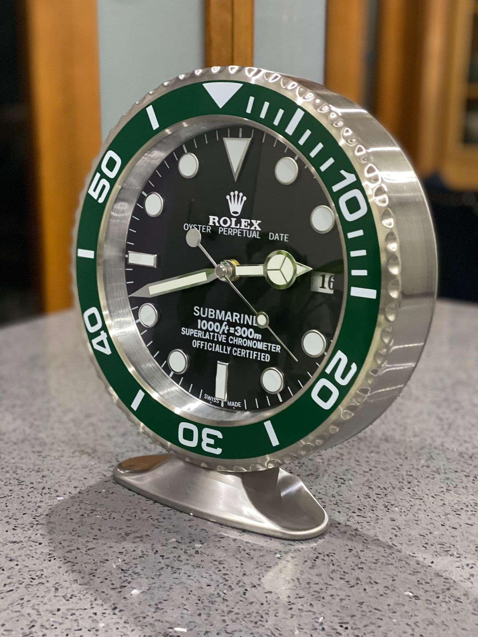 ROLEX Officially Certified Oyster Perpetual Green Hulk Submariner Desk Clock 
Luminous hands.
Fully functional date.
Sweeping hands.
Quartz movement.
Good condition, working.
Free international shipping.