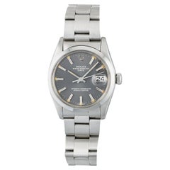 Reloj Rolex OP 1500 esfera gris de acero inoxidable, años 70