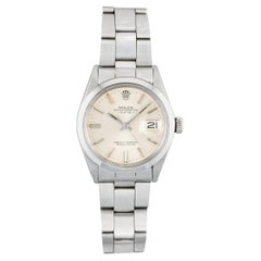 Reloj Rolex OP 1500 esfera plateada, años 1960-70