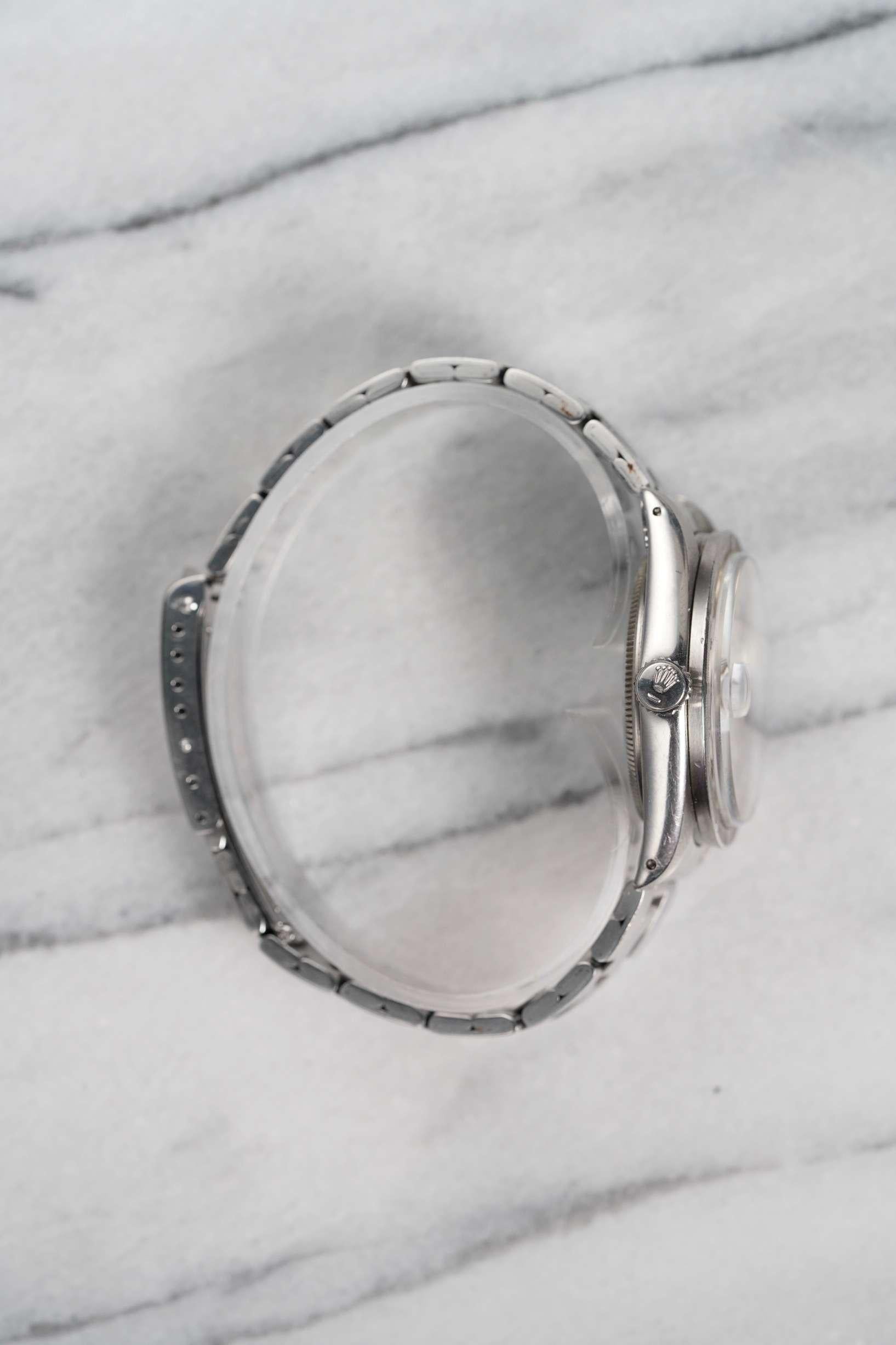 Montre Rolex OP 1501 en acier inoxydable, cadran argenté à rayures verticales, années 1970 Bon état - En vente à New York, NY