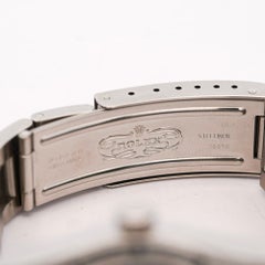 Rolex OP Date 15210 Steel Blue Dial Engine Turned Bezel Watch