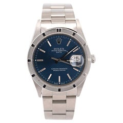 Rolex OP Date 15210 Steel Blue Dial Engine Turned Bezel Watch