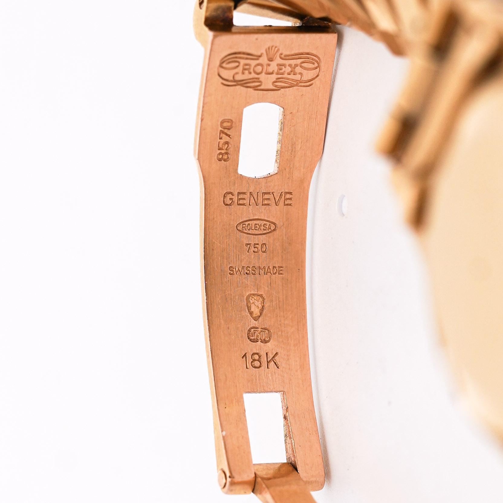 Vintage 18K yellow gold Rolex Oyster Perpetual Datejust featuring an aftermarket diamond bezel and presidential bracelet with white Roman numeral dial.

Product Specifications:
Item Type: Ladies Luxury Watch
Brand: Rolex Oyster Perpetual