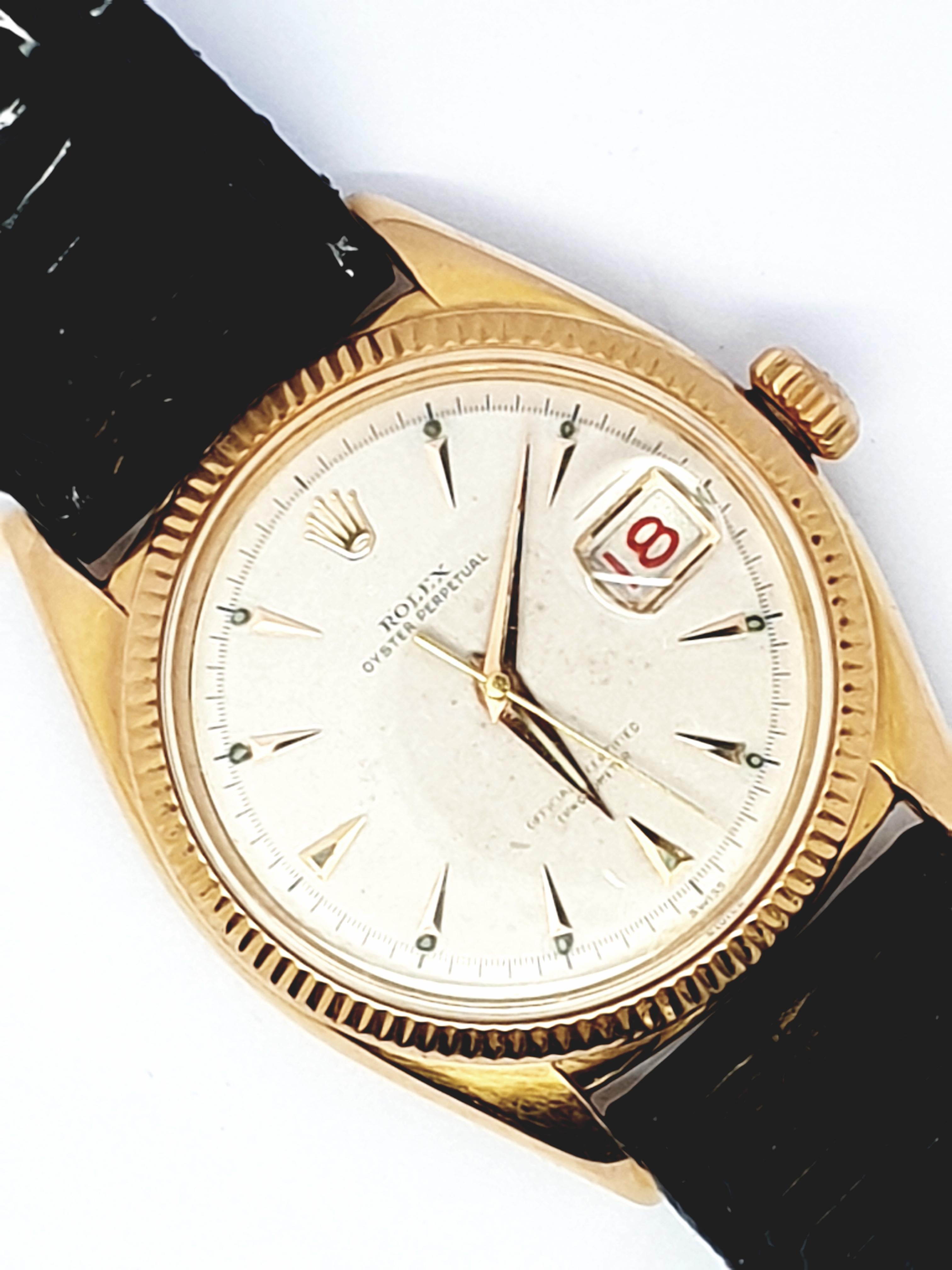 An early, rare, and fine condition Rolex “Ovetone” Datejust model ref 6305 serial # 224,xxx circa 1957 with original dial with red print date wheel. Featuring 36 mm diameter 18 Kt yellow gold case with finely milled bezel, and acrylic dome crystal