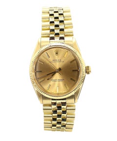 Rolex Oyster 1005 Champagne Dial Gold Vintage Watch