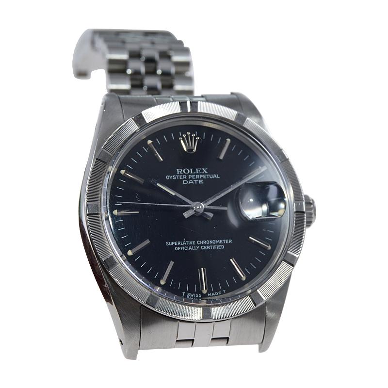 Rolex Steel Oyster Perpetual Date with Original Black Dial and Papers circa 1970 For Sale 2
