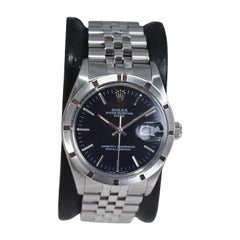 Rolex Steel Oyster Perpetual Date mit original schwarzem Zifferblatt und Papieren um 1970