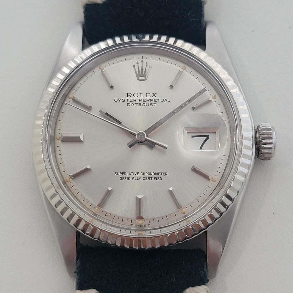 Timeless classic, Men's Rolex Oyster Perpetual 1601 Datejust automatic with 18k white gold bezel, c.1971, in excellent working condition. Verified authentic by a master watchmaker. Gorgeous Rolex signed silver dial, applied baton index hour markers,