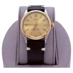 Rolex Oyster Perpetual 1002 34mm Champagne Dial Yellow Gold Steel Leather Strap