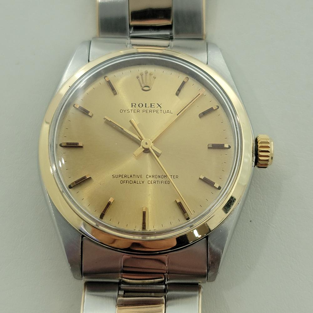 Timeless luxury classic, Men's Rolex Ref.1002 Oyster perpetual automatic 14k solid gold bezel, c.1966, all original, in excellent working condition. Verified authentic by a master watchmaker. Gorgeous Rolex signed gold dial, applied baton index hour