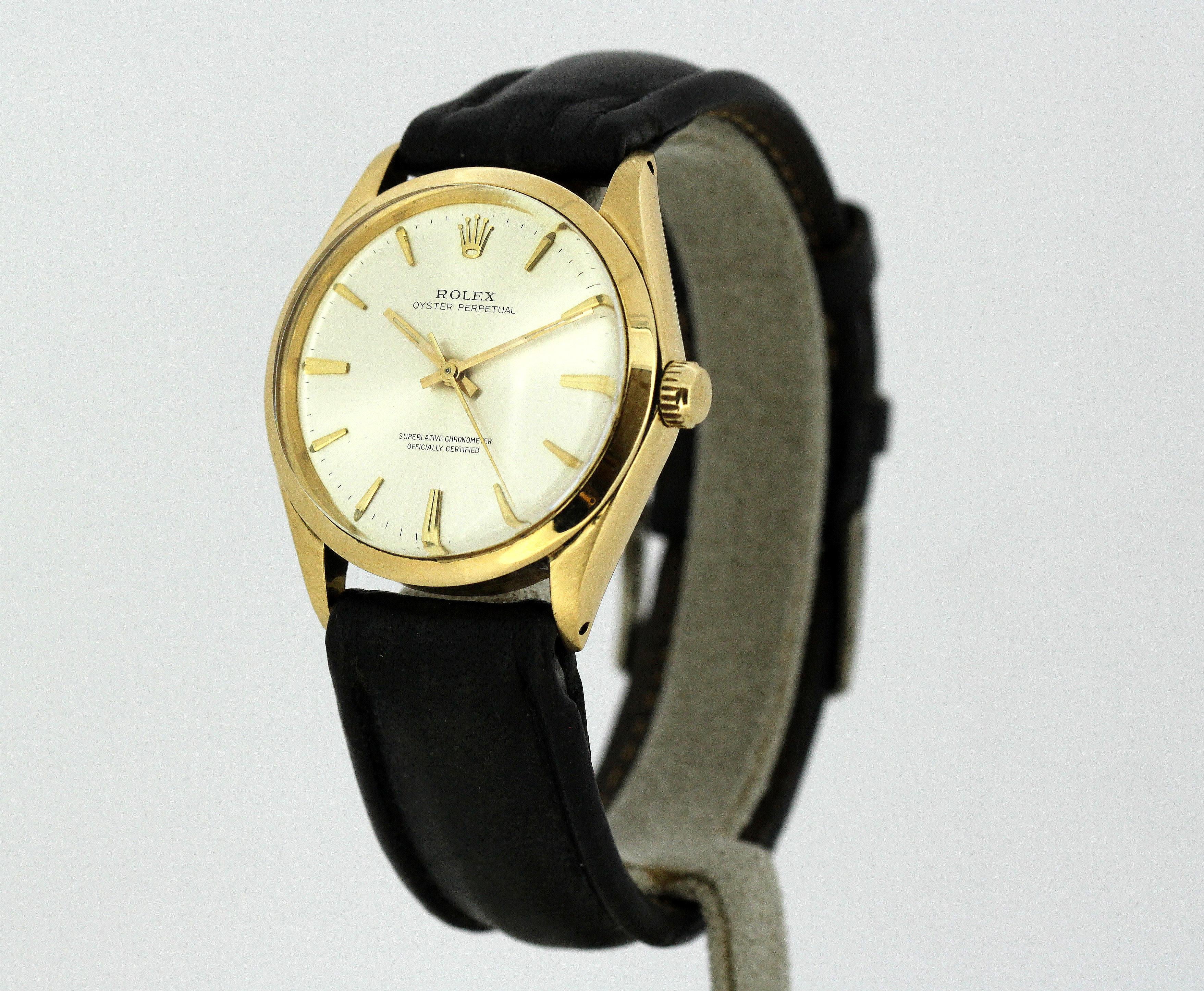 Rolex - Oyster Perpetual - 1002 - Men - 1970's

Gender:	Men
Model : Oyster Perpetual
Case Diameter : 34 mm
Movement: Automatic
Watchband Material: Leather
Case material : 18K Gold
Display Type:	Analogue	
Age: 1970's
Dial: (See Photos)
Hands :