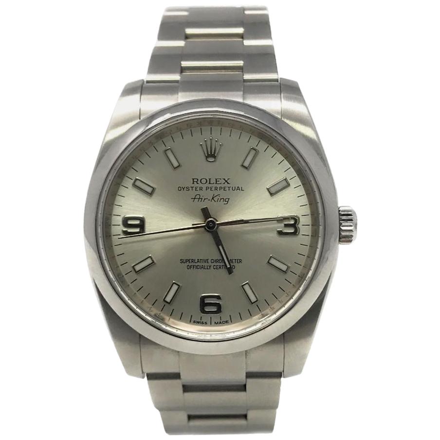 Rolex Oyster Perpetual 114200 with Band and Silver Dial For Sale