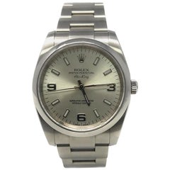 Rolex Oyster Perpetual 114200 with Band and Silver Dial