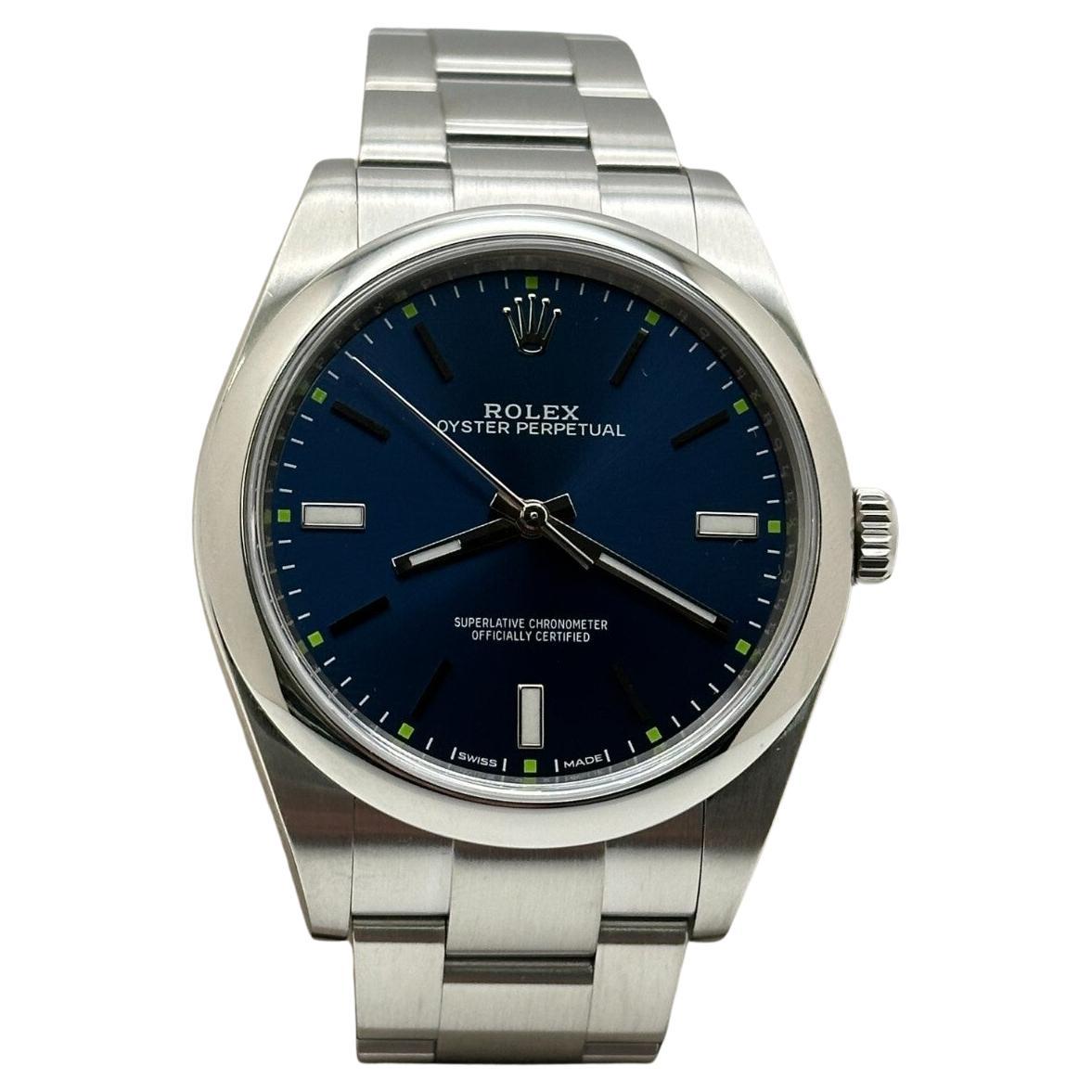 Rolex Oyster Perpetual 114300 39mm Blaues Zifferblatt Edelstahl Box Papier