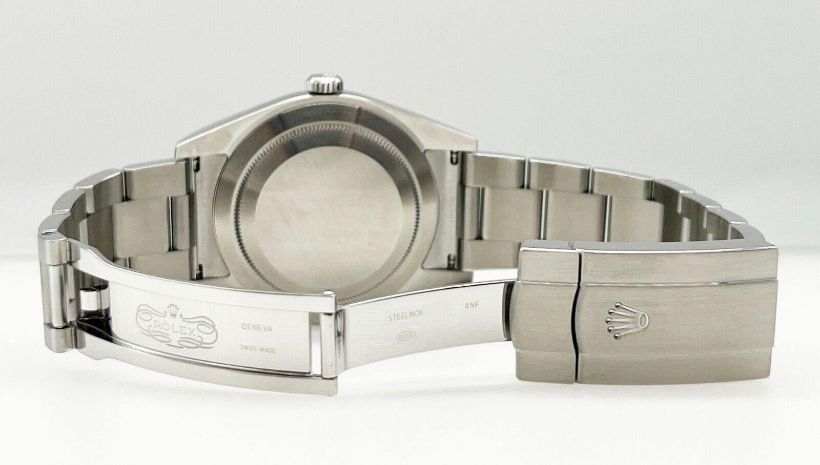 Rolex Oyster Perpetual 114300 Blaues Zifferblatt Edelstahl Box 39mm 1