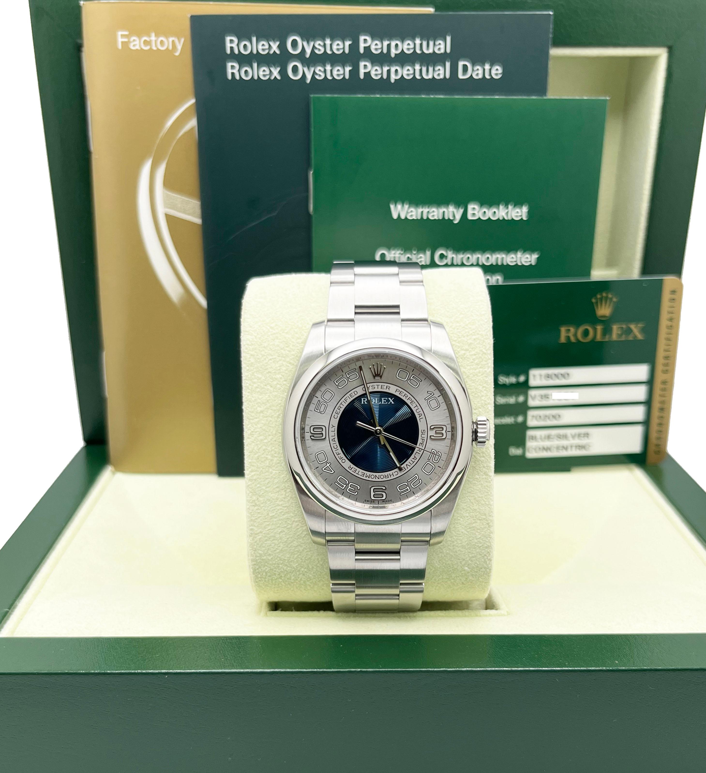Style Number: 116000

Serial: V351***

Year: 2010

Model: Oyster Perpetual 

Case Material: Stainless Steel

Band: Stainless Steel

Bezel: Stainless Steel

Dial: Concentric Blue & Silver

Face: Sapphire Crystal

Case Size: 36 mm

Includes: 

-Rolex