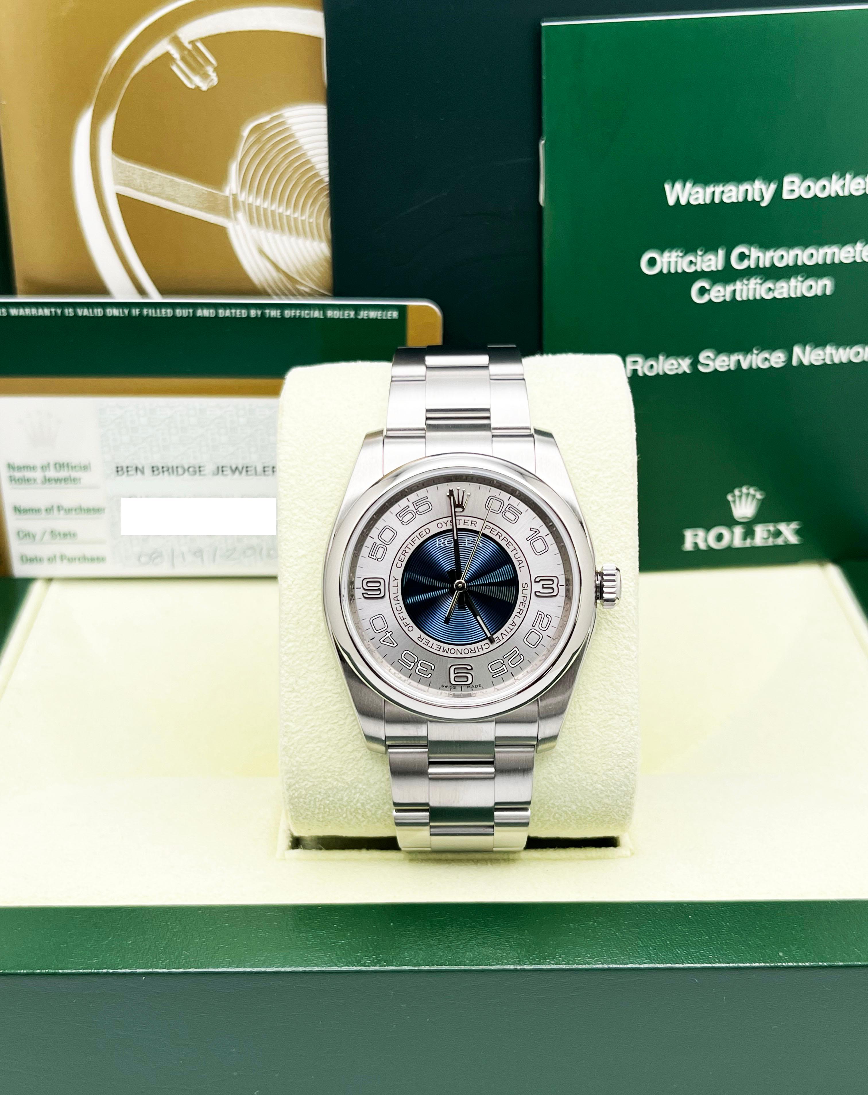 Rolex Oyster Perpetual 116000 36mm Concentric Blue Silver Dial Steel Box Paper In Excellent Condition For Sale In San Diego, CA