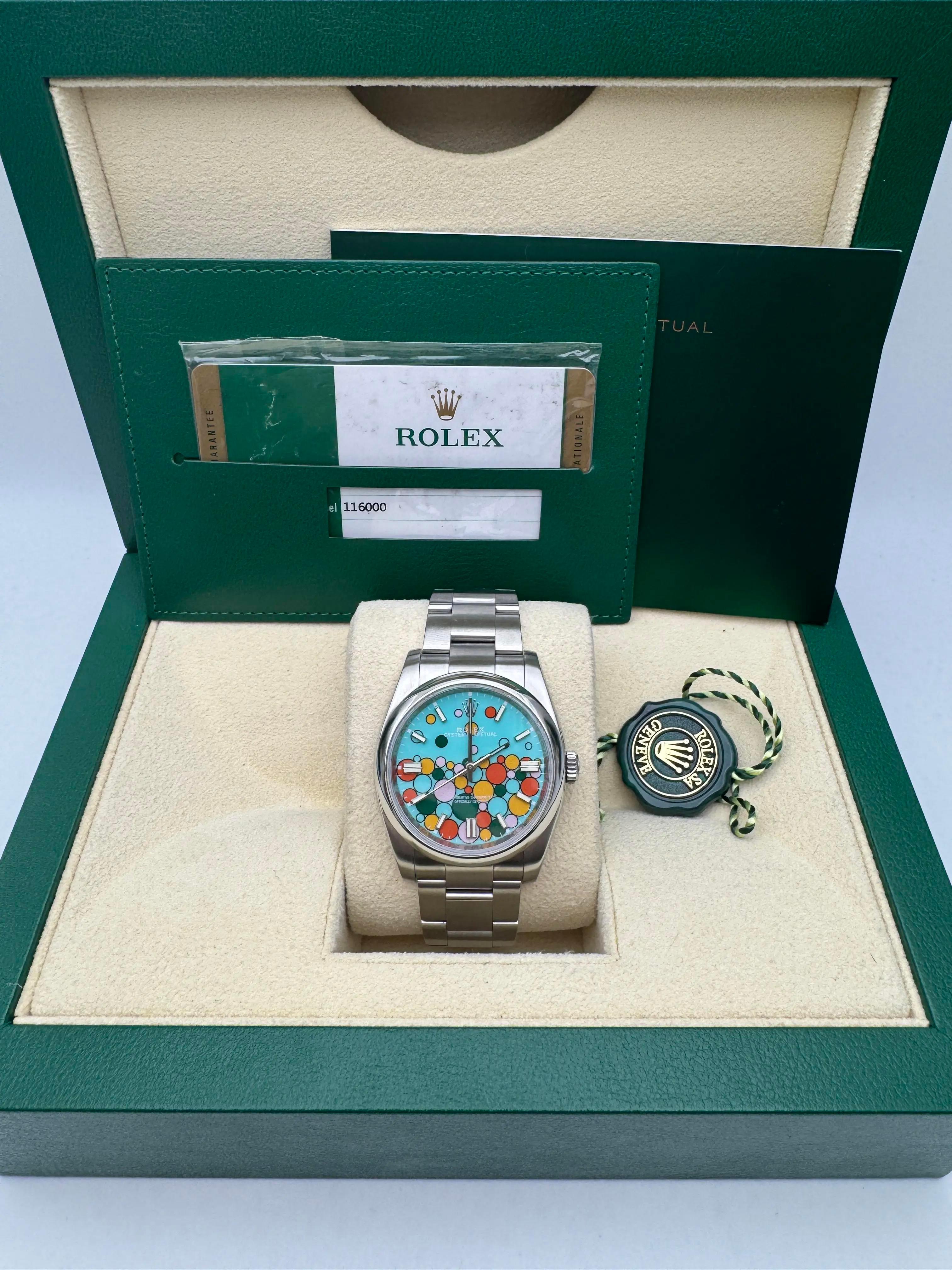 Rolex Oyster Perpetual 36mm, reference 116000. Watch is in pristine condition, with a custom Celebration Dial swapped for the original dial. The custom dial is excellent quality with full luminous function. Only the dial has been swapped, the rest