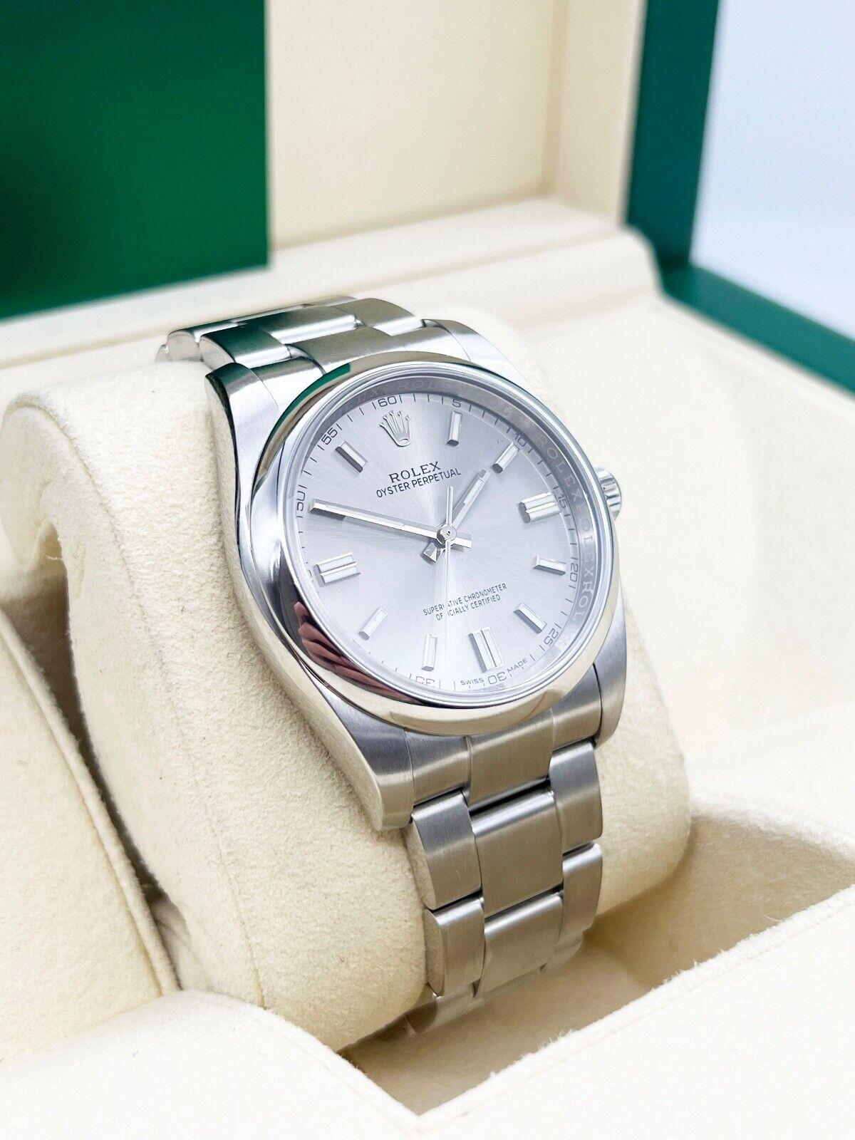 Style Number: 116000

Serial: 155V1***

Year: 2018
 
Model: Oyster Perpetual
 
Case Material: Stainless Steel
 
Band: Stainless Steel
  
Bezel: Stainless Steel
  
Dial: Silver
 
Face: Sapphire Crystal
 
Case Size: 36mm
 
Includes: 
-Rolex Box &