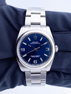 Rolex Oyster Perpetual 116000 Blue Dial Steel Mens Watch Box Papers