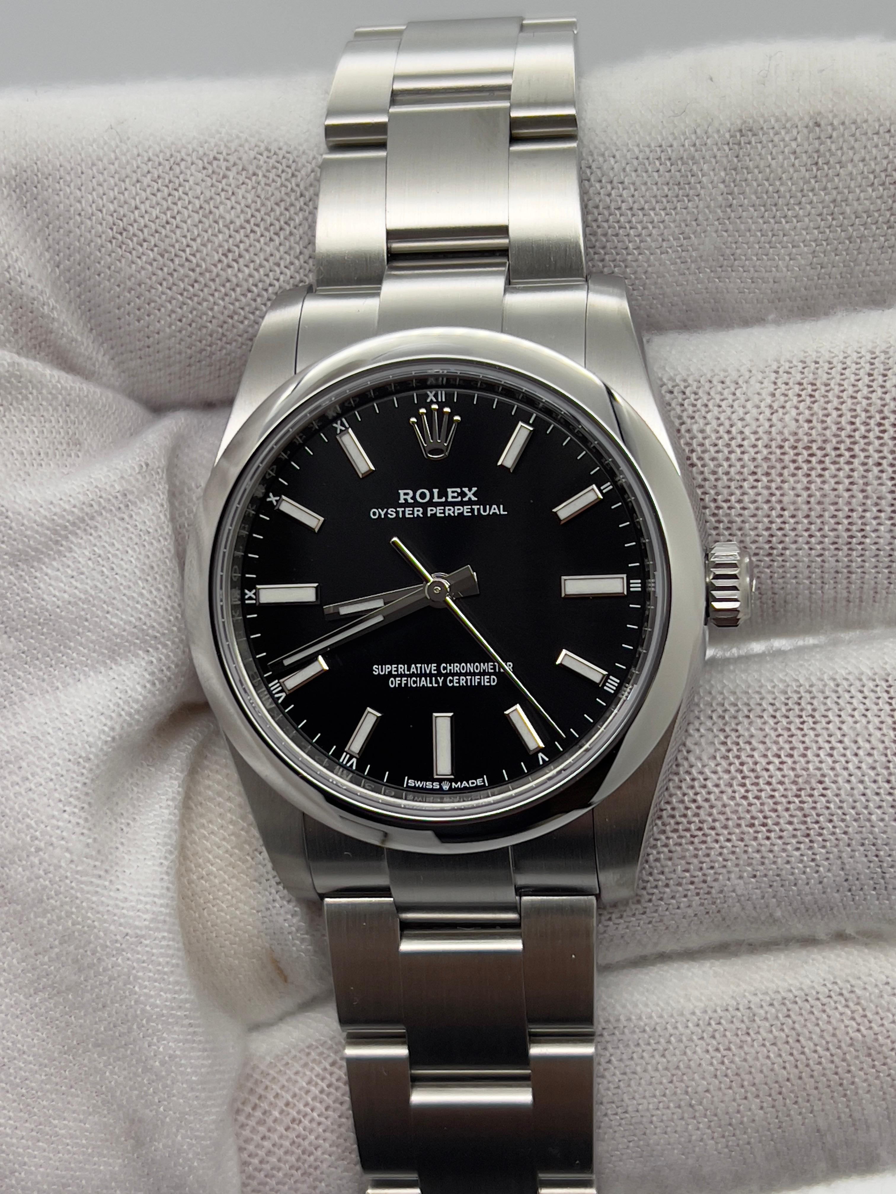 Rolex Oyster Perpetual 124200 34mm Schwarzes Zifferblatt aus Edelstahl für Damen oder Herren