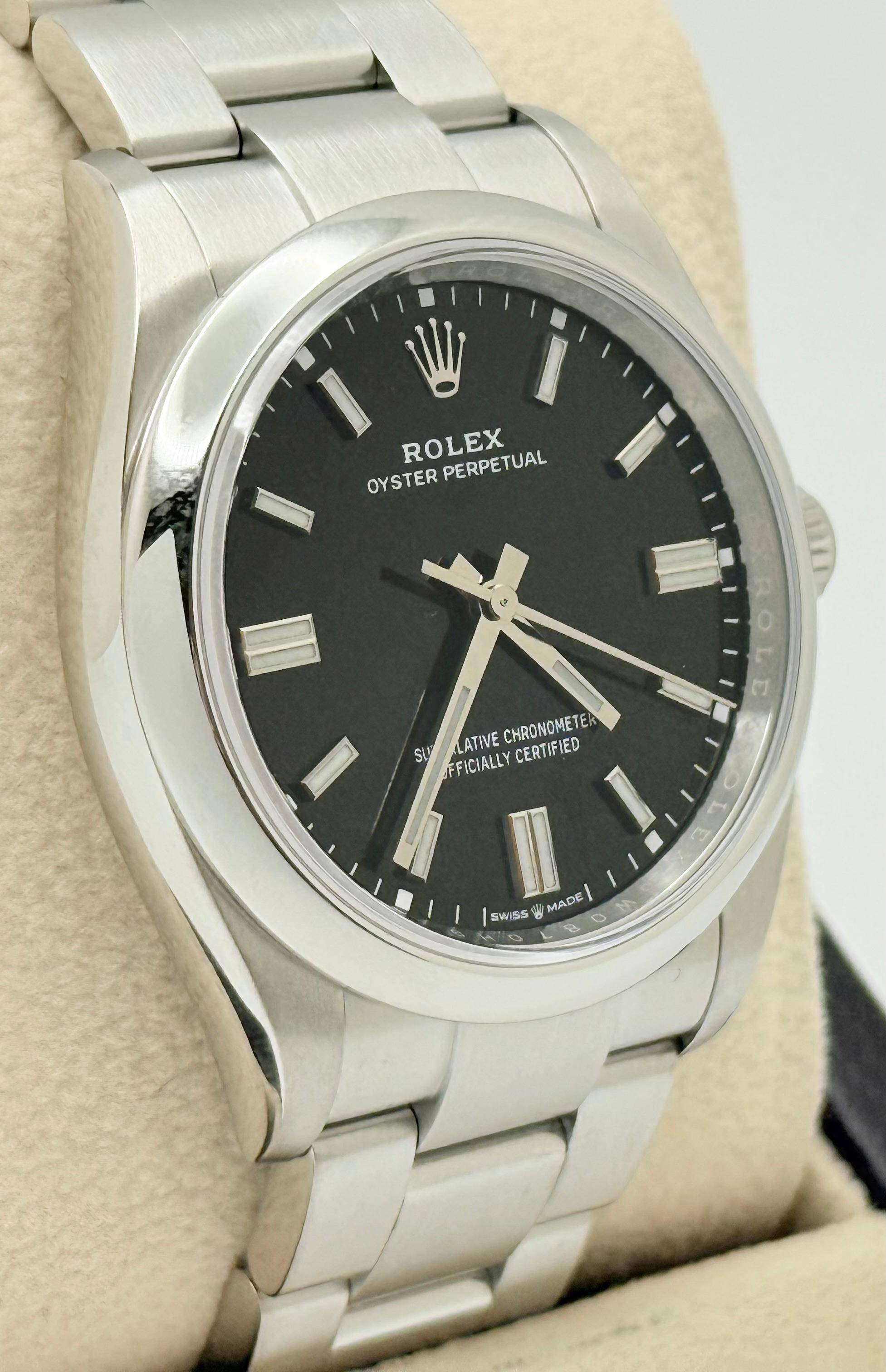 Rolex Oyster Perpetual 126000 36mm Quadrante Nero Acciaio Scatola Carta 2021 in vendita 1