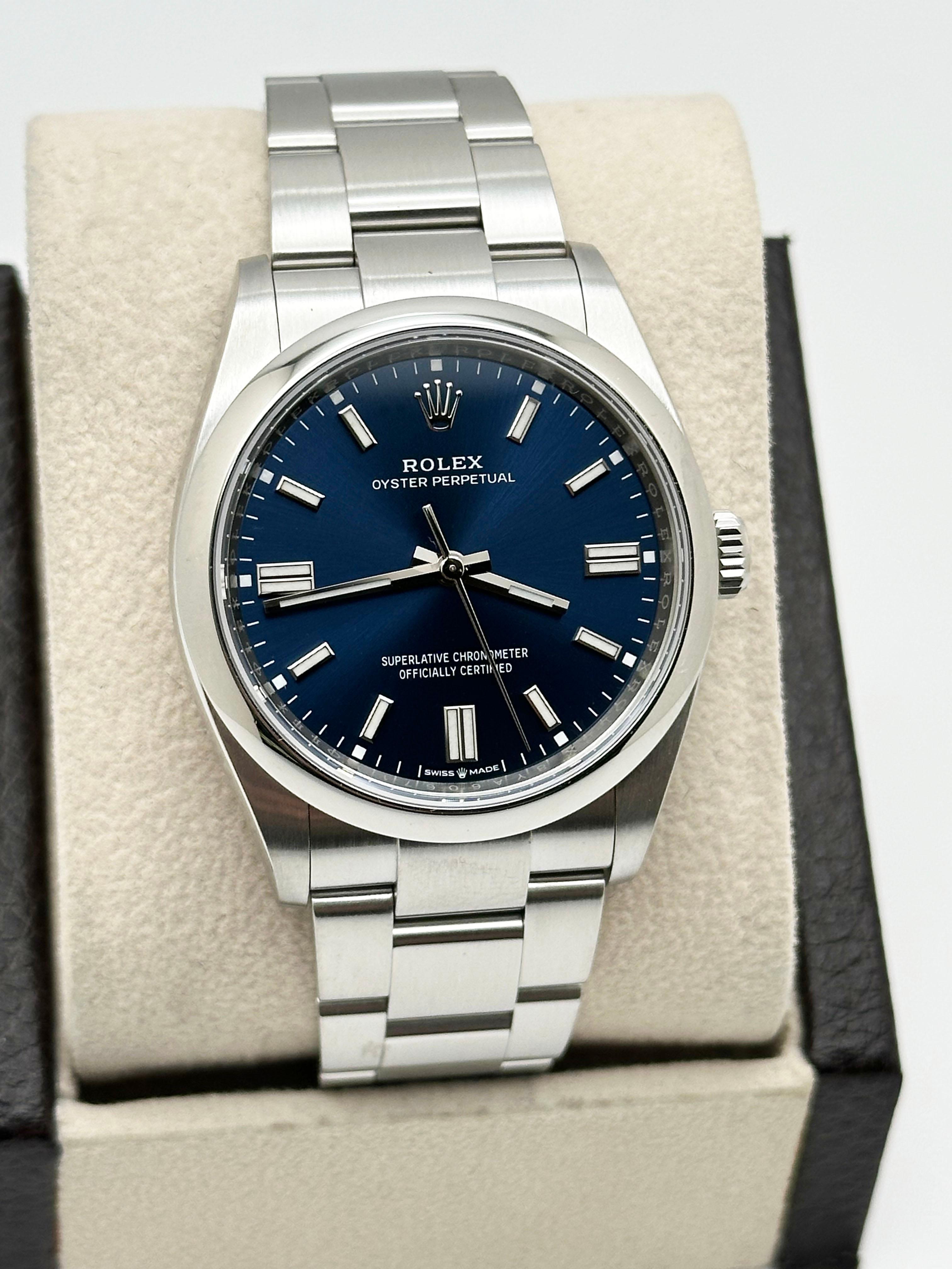 Style Number: 126000


Serial: 8YA60***


Year: 2022


Model: Rolex Oyster Perpetual 

Case Material: Stainless Steel 


Band: Stainless Steel 


Bezel: Stainless Steel 

Dial: Blue 

Face: Sapphire

Case Size: 36mm 

Includes: 

-Rolex Box &