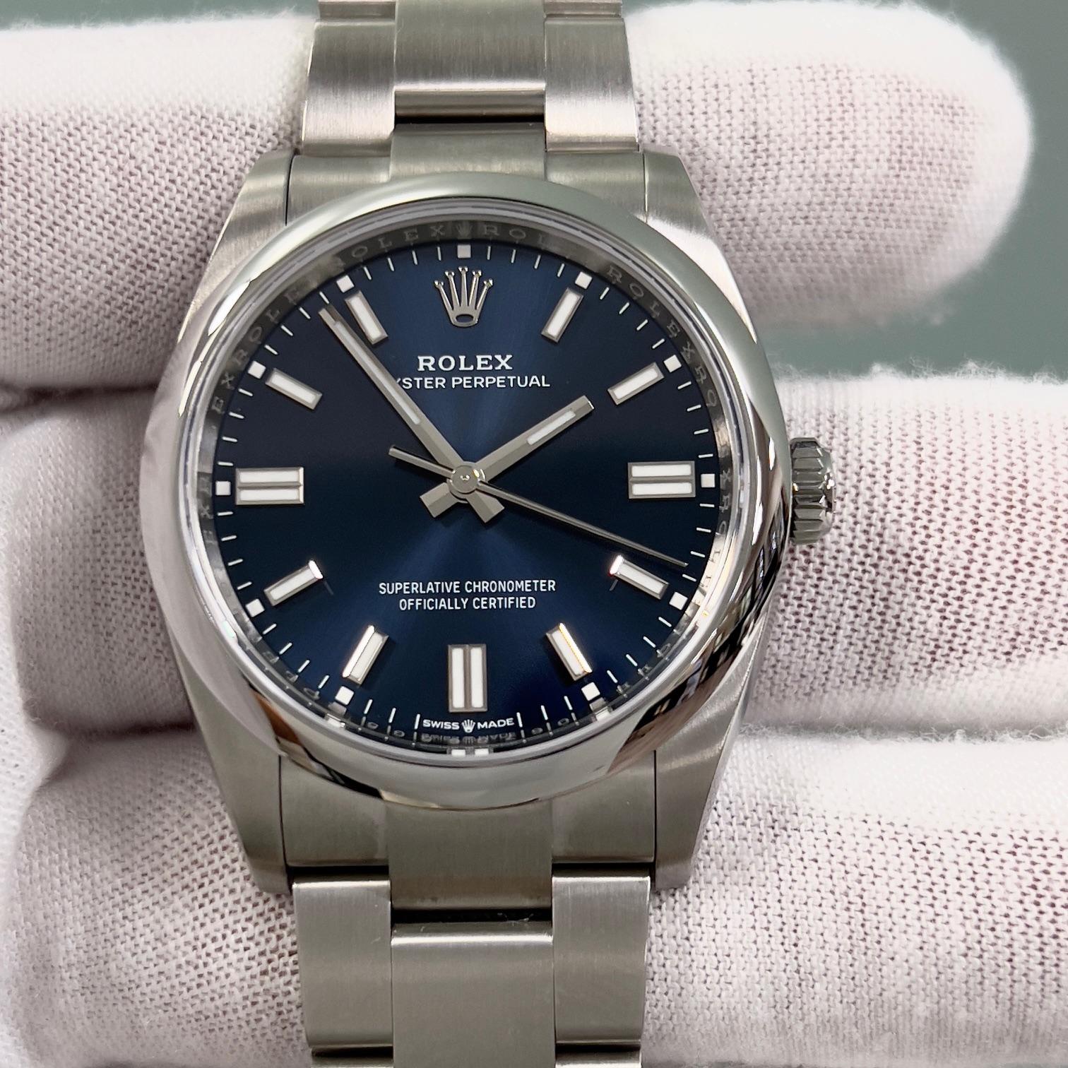 Rolex Oyster Perpetual 126000 36mm Blue Dial Stainless Steel Box Paper 2022 In Excellent Condition For Sale In San Diego, CA