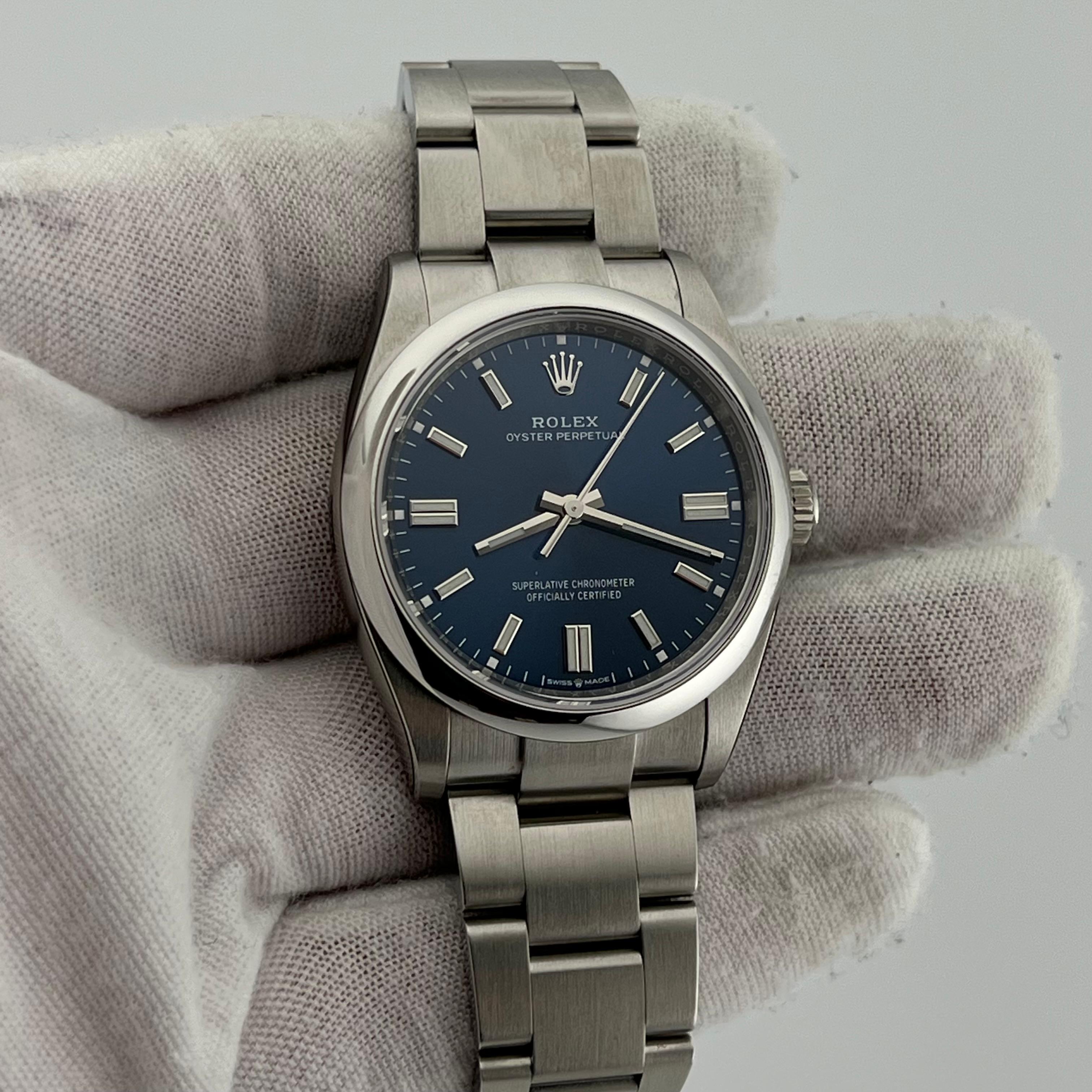 Rolex Oyster Perpetual 126000 36mm Blaues Zifferblatt Stahl Box Papier 2023 mit Stickers im Angebot 6