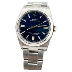 Rolex Oyster Perpetual 126000 36mm Blaues Zifferblatt Stahl Box Papier 2023 mit Stickers