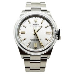 Used Rolex Oyster Perpetual 126000 Silver Dial Stainless Steel Box Paper 2021