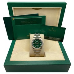Rolex Oyster Perpetual 126000 Steel 36mm Green Dial Automatic Watch Box Papers