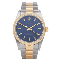 Rolex Oyster Perpetual 14233 Unisex Stainless Steel and Yellow Gold Watch