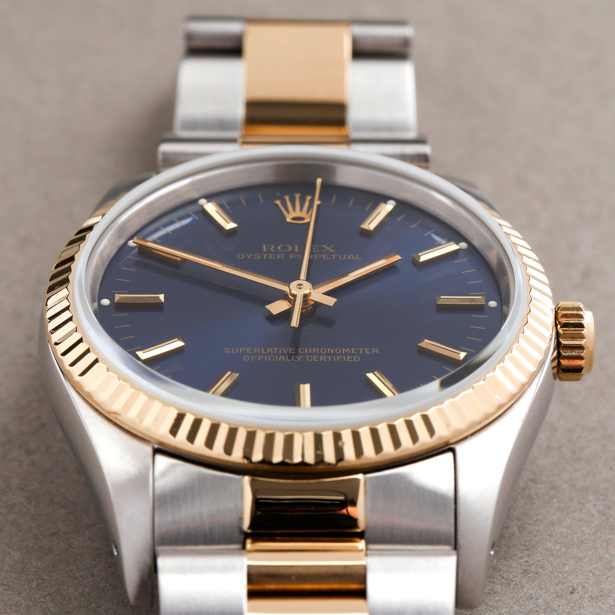 Rolex Oyster Perpetual 14233 Unisex Stainless Steel and Yellow Gold Watch 3