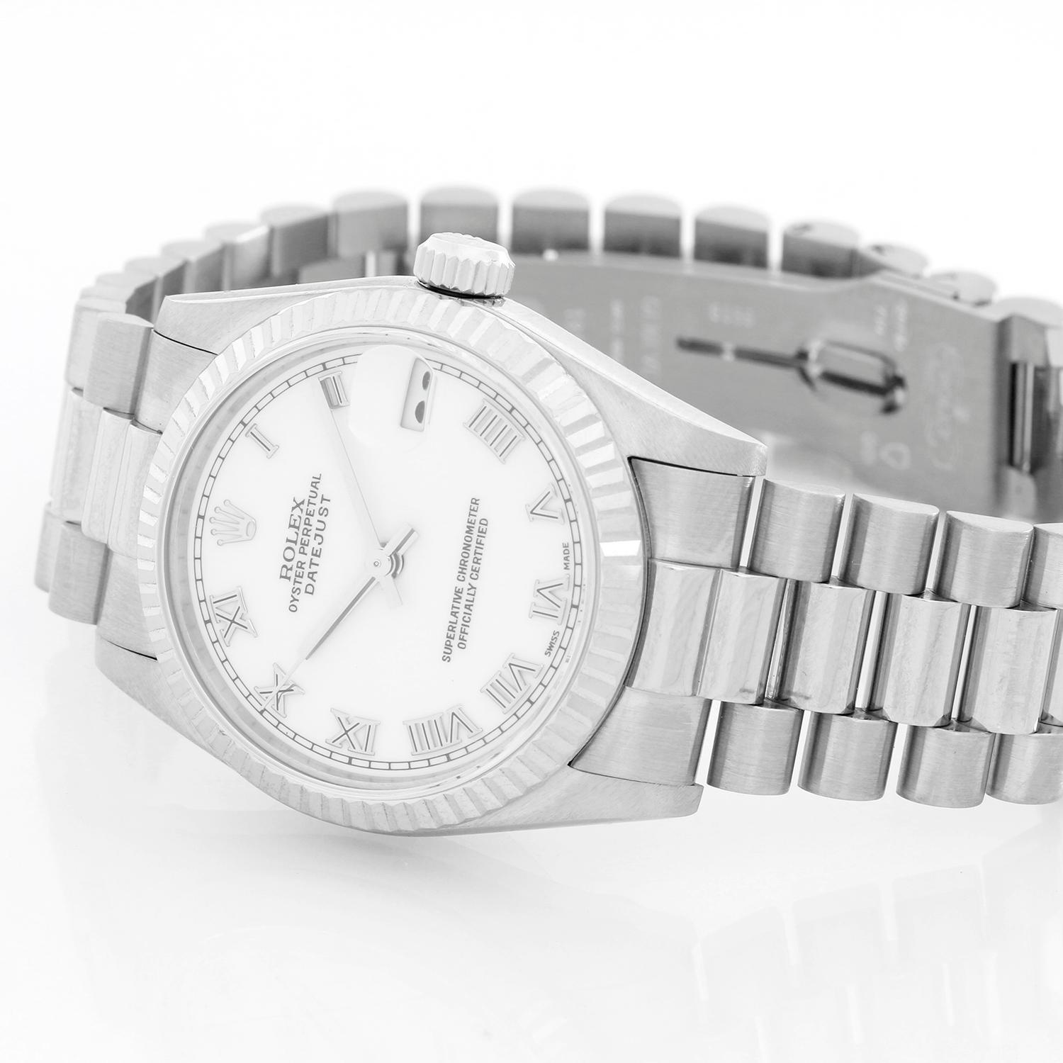 Rolex Oyster Perpetual 18k White Gold Midsize  Watch 68279 - Automatic winding, 29 jewels, Quickset date, sapphire crystal. 18k white gold with fluted bezel ( 30 mm ). White dial with raised Roman numerals. White gold President bracelet. Pre-owned