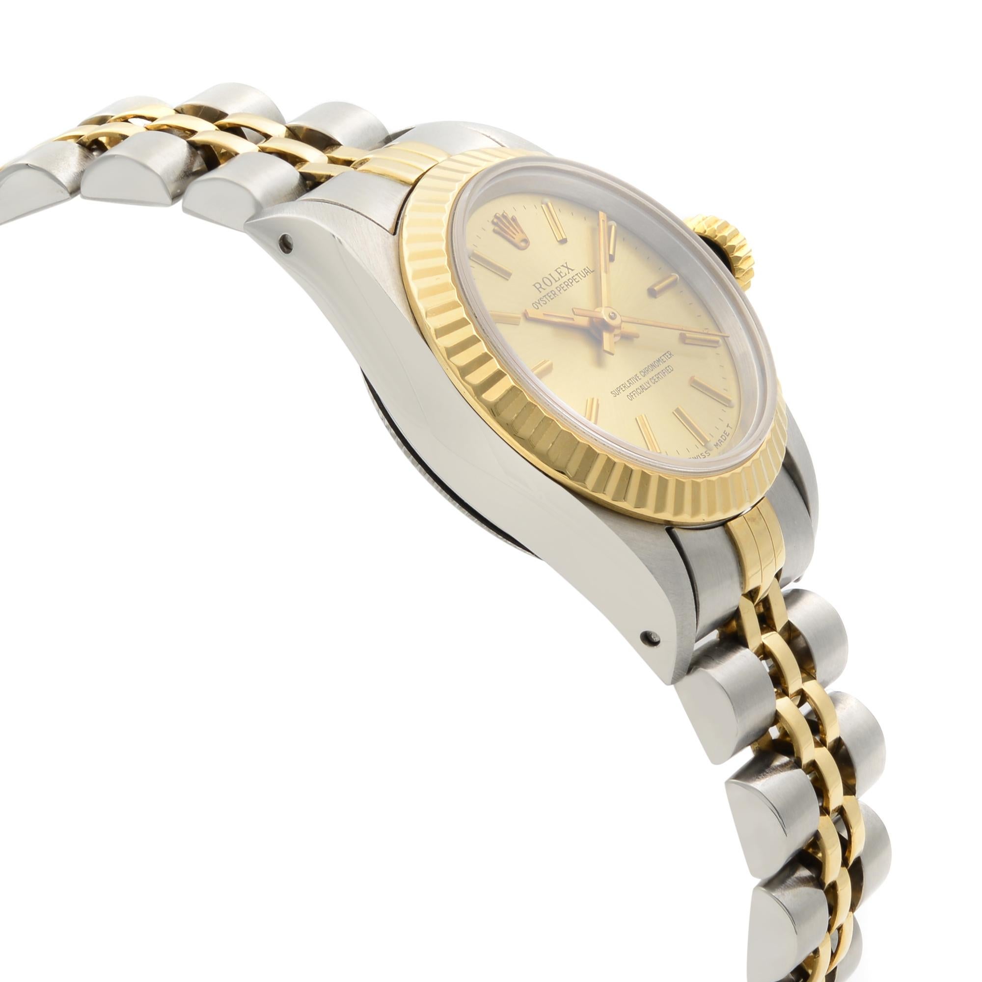 Rolex Oyster Perpetual 18k Yellow Gold Steel Champagne Dial Ladies Watch 67193 In Excellent Condition In New York, NY