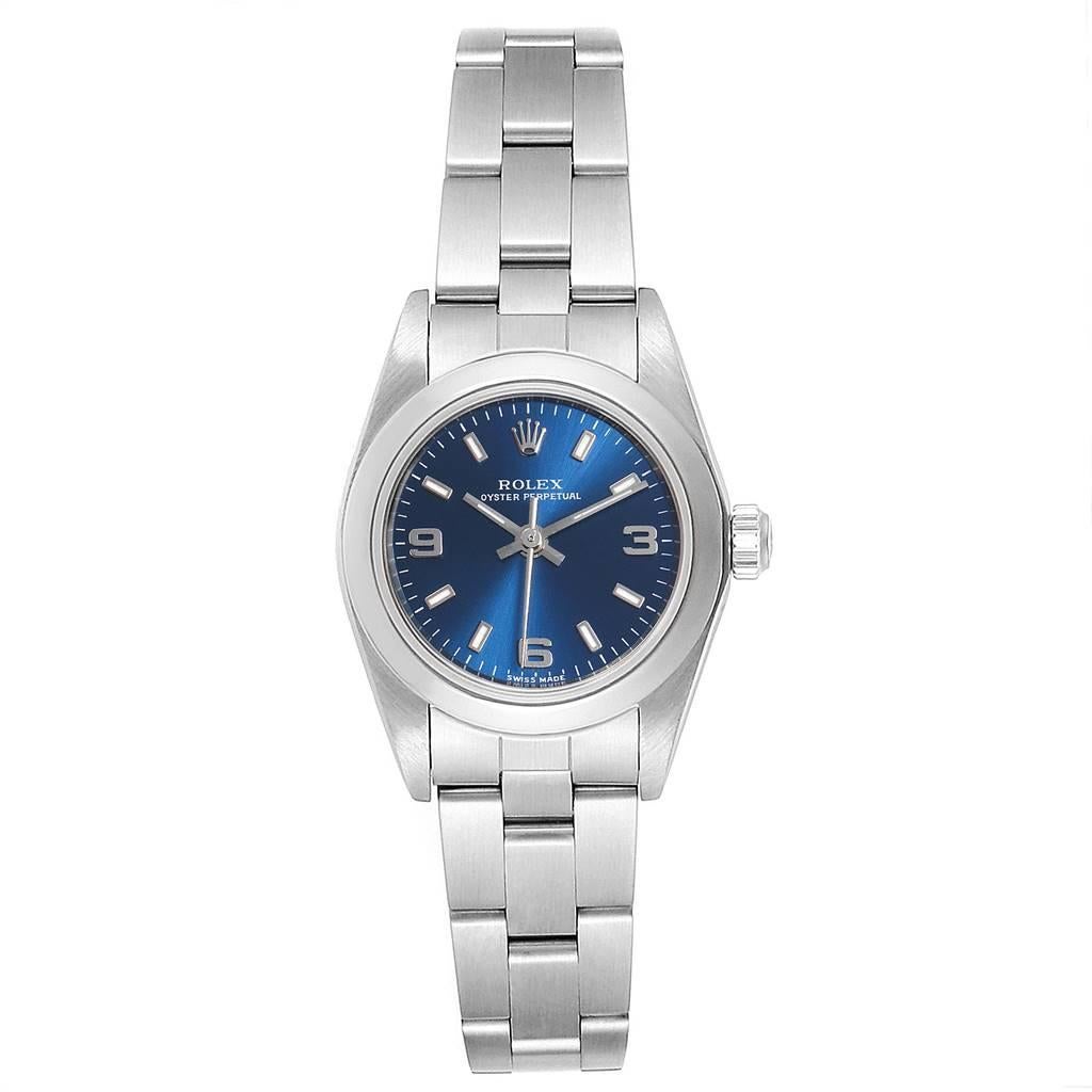 Rolex Oyster Perpetual 24 Blue Dial Ladies Watch 76080 Box Papers. Officially certified chronometer self-winding movement. Stainless steel oyster case 24.0 mm in diameter. Rolex logo on a crown. Stainless steel smooth domed bezel. Scratch resistant