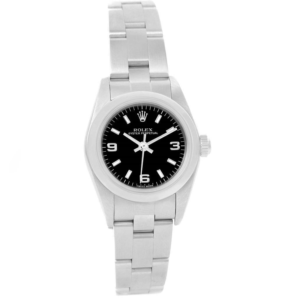 Rolex Oyster Perpetual 24 Nondate Black Dial Ladies Watch 76080. Officially certified chronometer self-winding movement. Stainless steel oyster case 24.0 mm in diameter. Rolex logo on a crown. Stainless steel smooth domed bezel. Scratch resistant