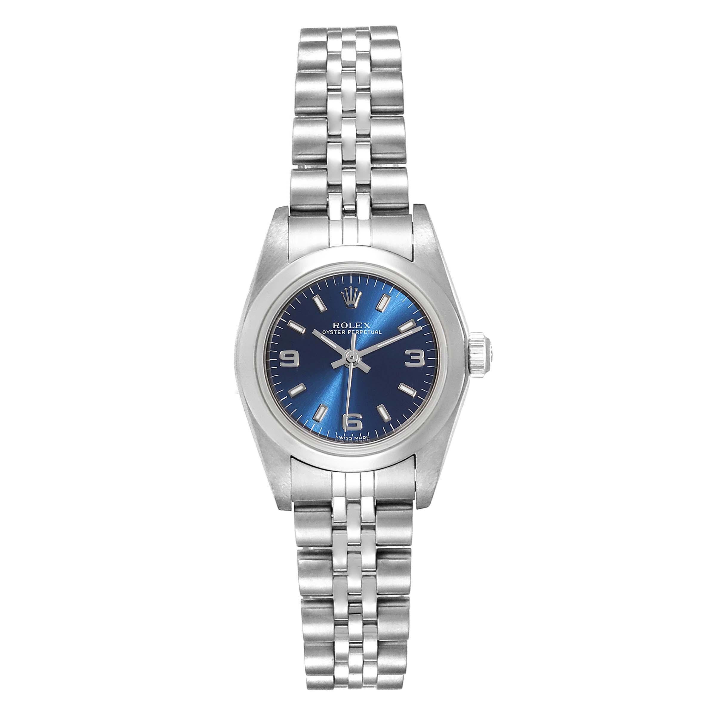 Rolex Oyster Perpetual 24 Nondate Blue Dial Ladies Watch 76080. Officially certified chronometer self-winding movement. Stainless steel oyster case 24.0 mm in diameter. Rolex logo on a crown. Stainless steel smooth domed bezel. Scratch resistant