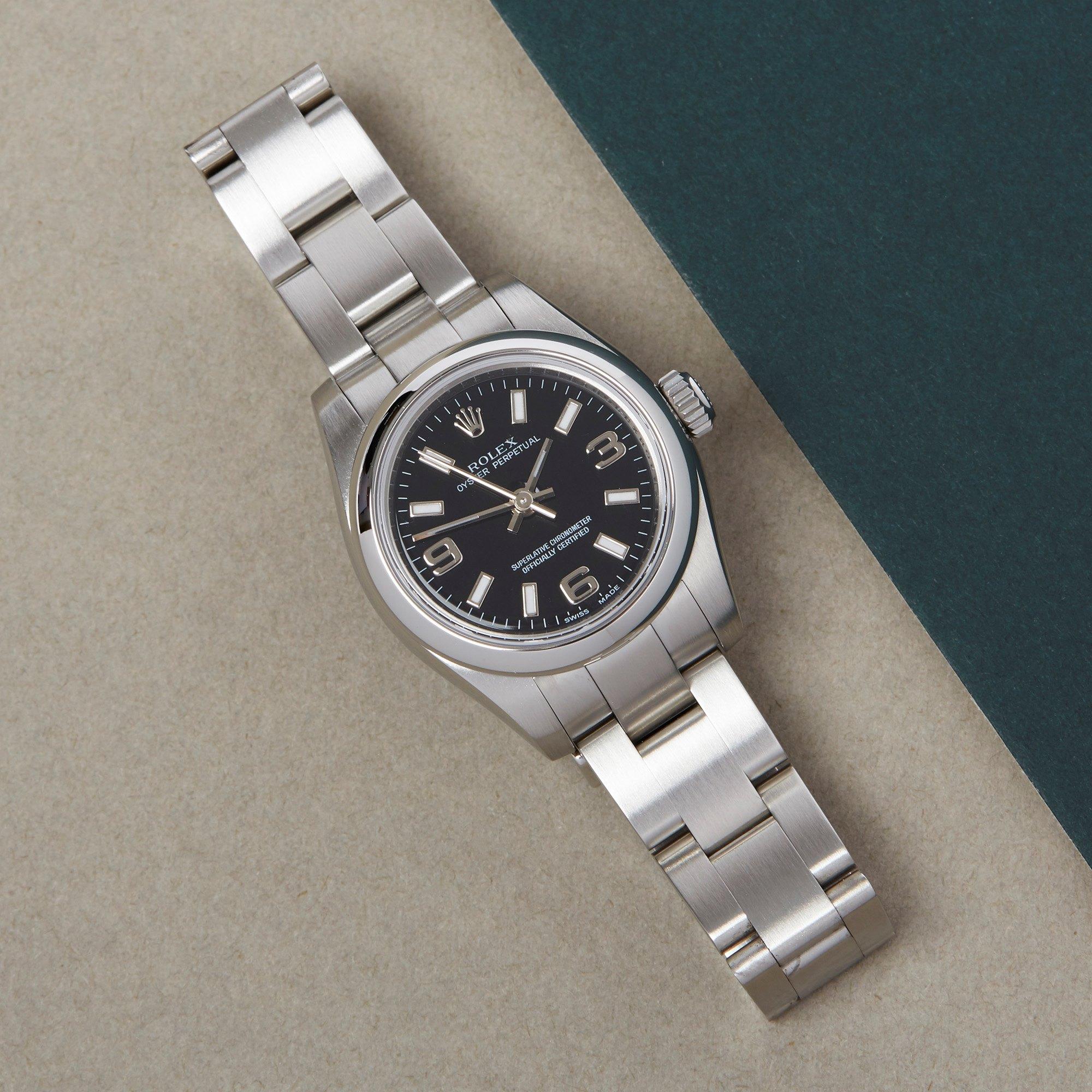 Xupes Reference: W007592
Manufacturer: Rolex
Model: Oyster Perpetual
Model Variant: 26
Model Number: 176200
Age: 2007
Gender: Ladies
Complete With: Rolex Box 
Dial: Black Baton
Glass: Sapphire Crystal
Case Size: 26mm
Case Material: Stainless