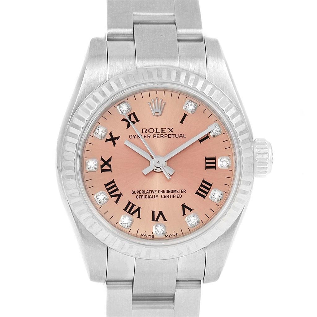Rolex Oyster Perpetual 26 Steel White Gold Diamond Ladies Watch 176234. Officially certified chronometer self-winding movement with quickset date function. Stainless steel oyster case 24.0 mm in diameter. Rolex logo on a crown. 18K white gold fluted
