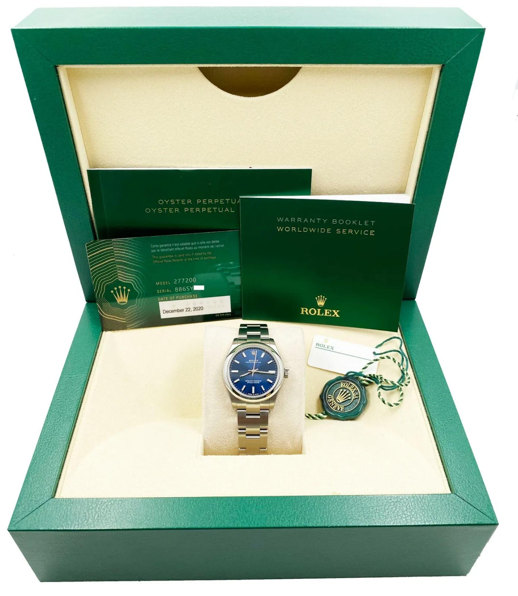 Style Number: 277200
Serial: 886SY***
Year: 2020
Model: Oyster Perpetual Midsize 
Case Material: Stainless Steel
Band: Stainless Steel
Bezel: Stainless Steel
Dial: Blue
Face: Sapphire Crystal 
Case Size: 31mm
Includes: 
-Rolex Box &