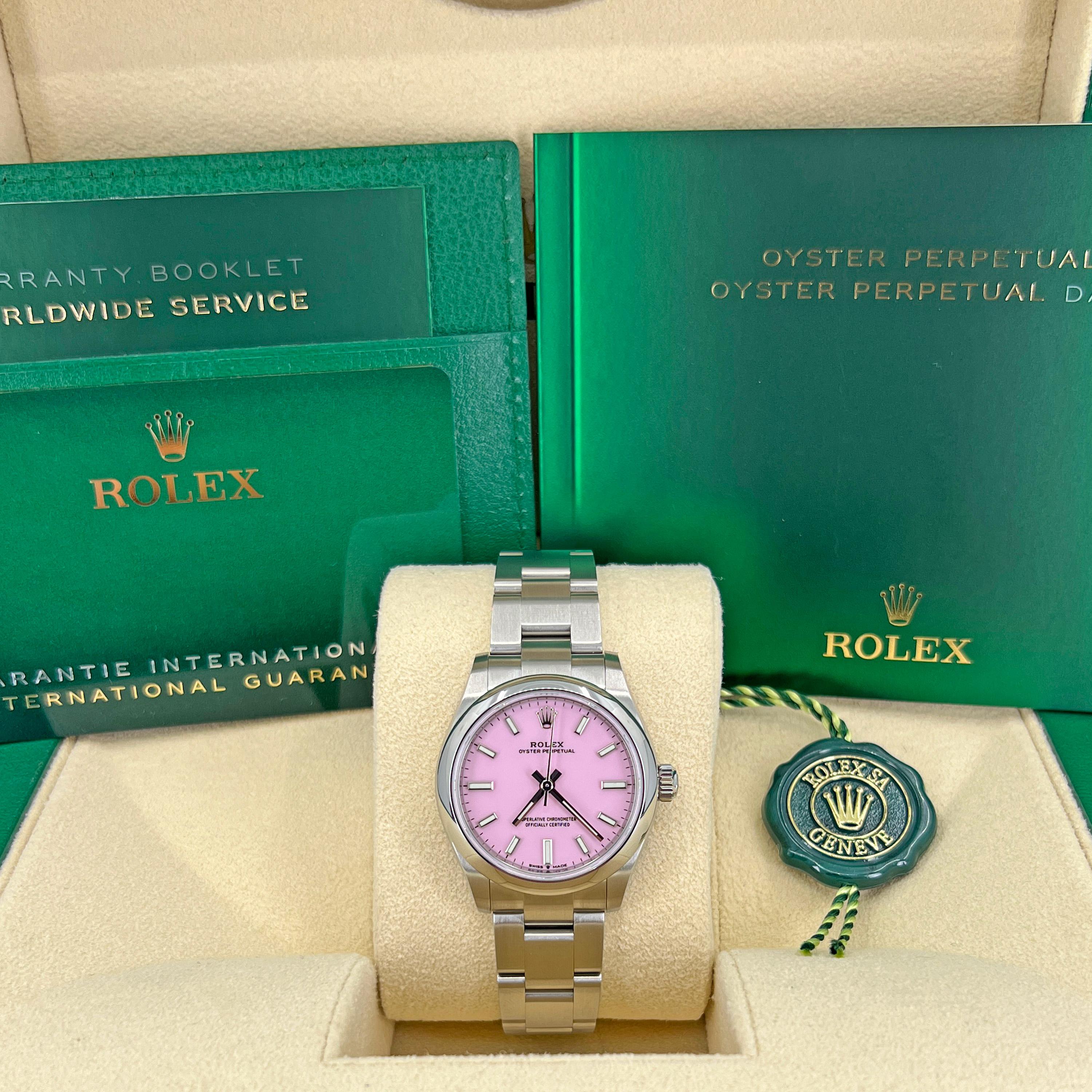 31 mm Oystersteel case, screw-down crown with twinlock double waterproofness system, domed bezel, scratch-resistant sapphire crystal, candy pink dial, index hour markers, Rolex calibre 2232 automatic movement with center hour, minute and seconds