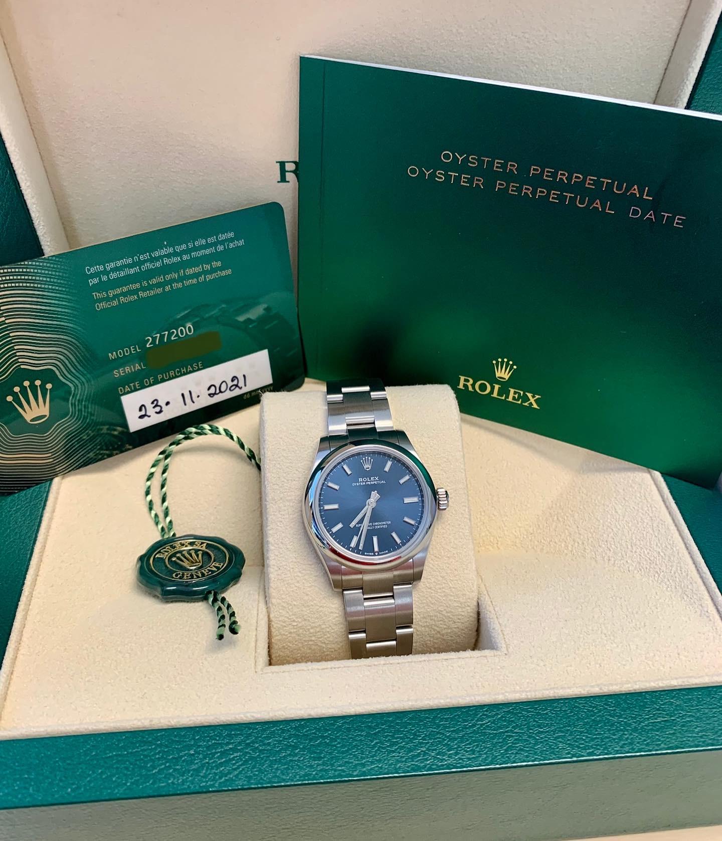Rolex Oyster Perpetual 31 Dunkelblaues Zifferblatt 277200 5