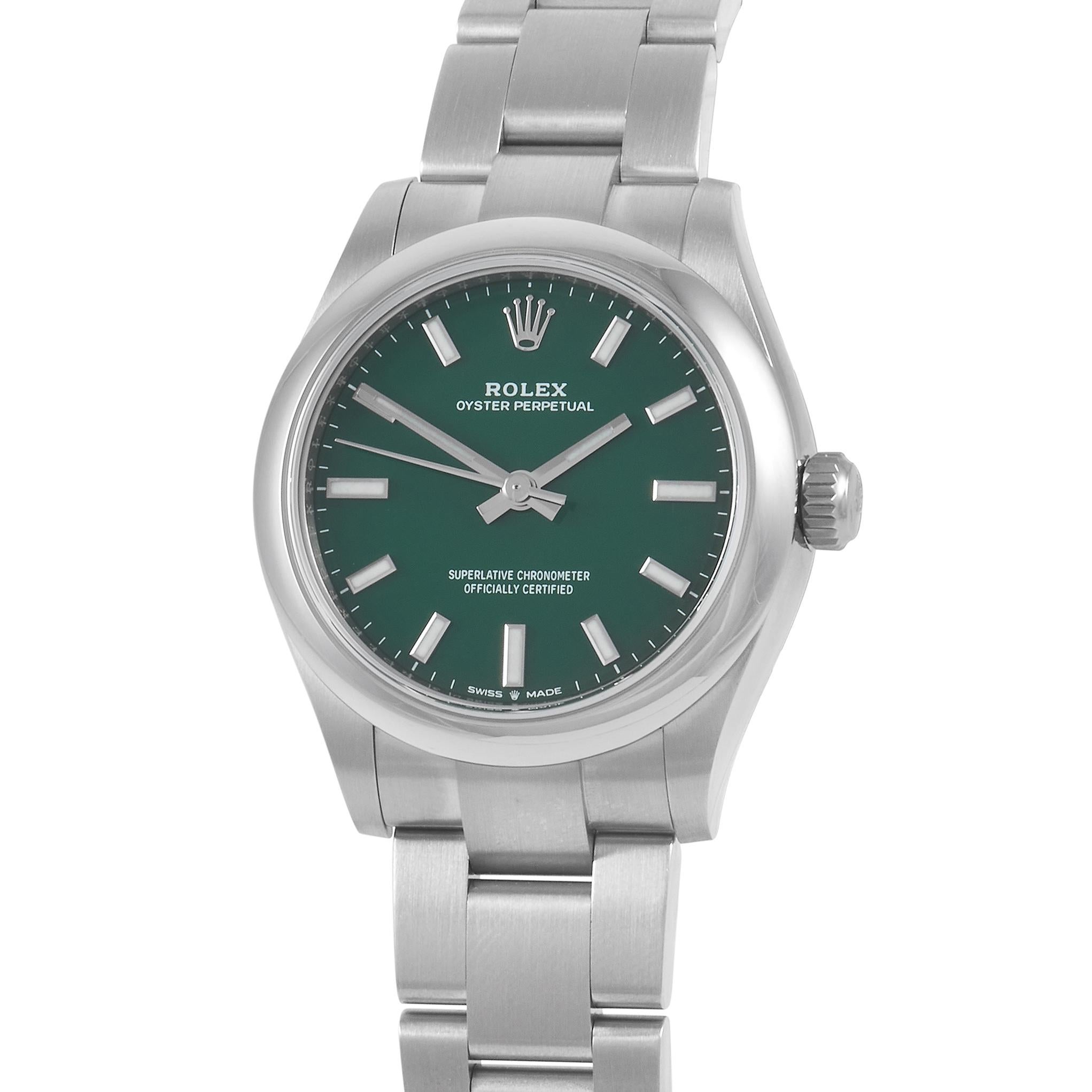 A fine lady's choice is this straightforward time-only Rolex Oyster Perpetual. It comes with a 31mm brushed steel case with polished finished sides and a smooth steel bezel. Adding a hint of character to the watch is a deep green dial with