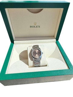 Rolex Oyster Perpetual 31 Midsize Salmon Dial Stainless Steel Ladies Watch 77080